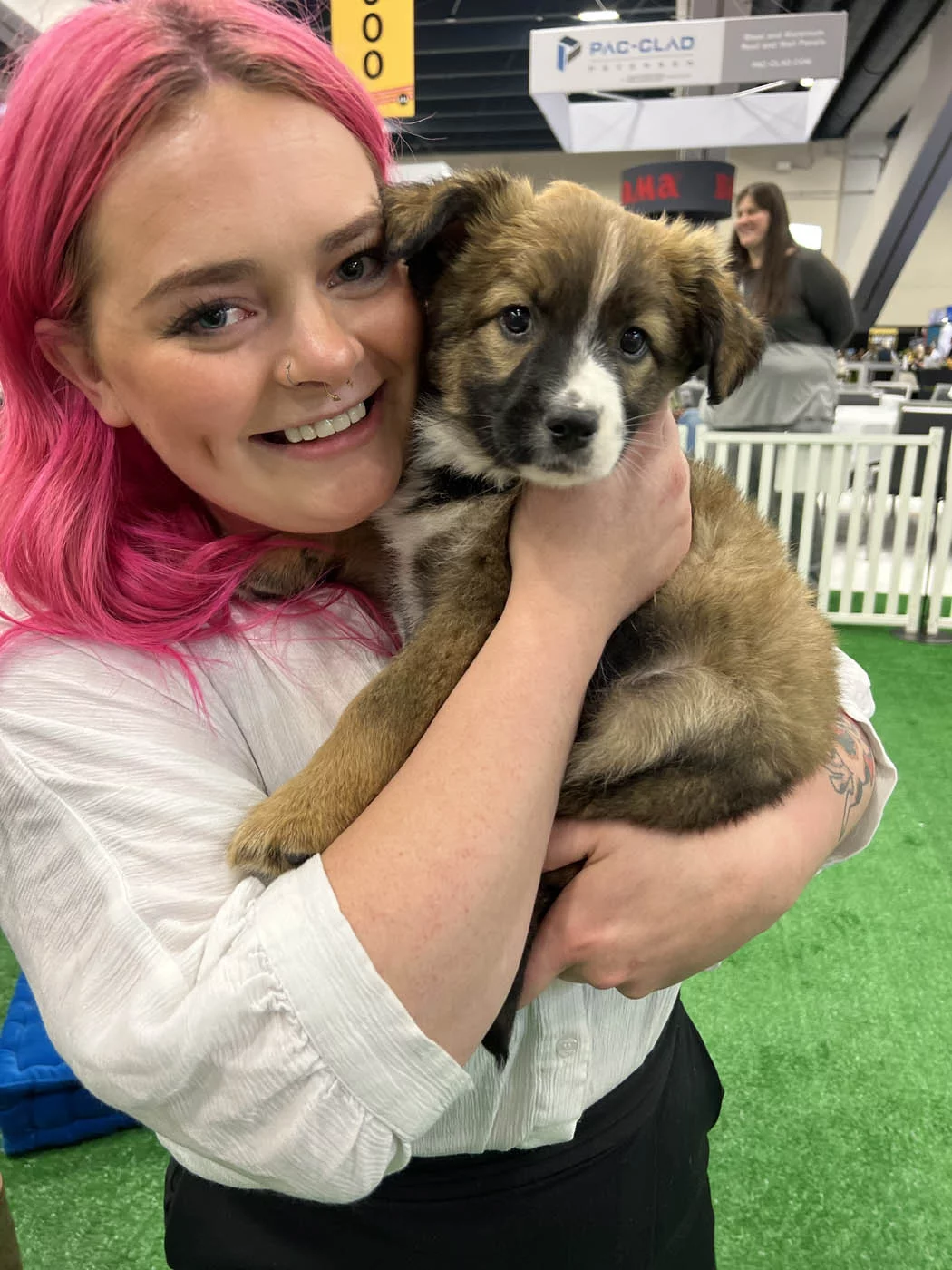 A puppy love™ puppy making the day of so many expo attendees!