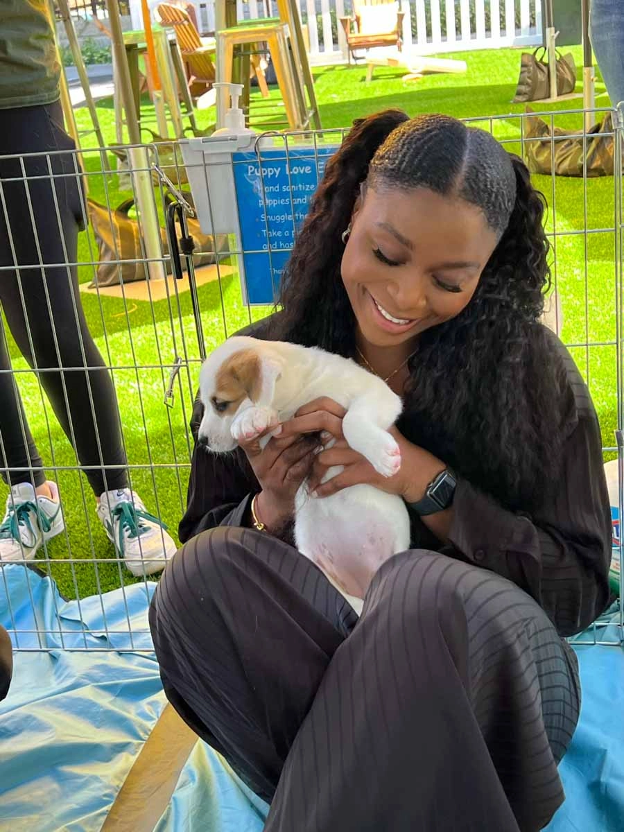 Woman holding puppy