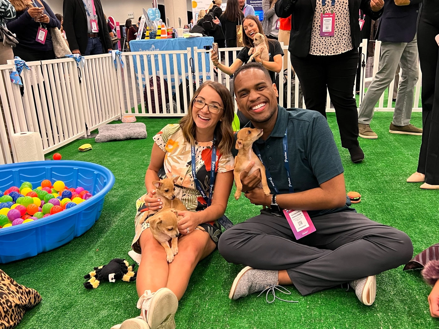 People holding puppies