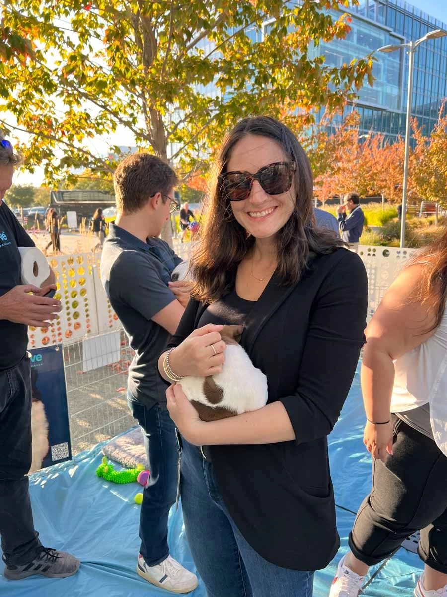 Woman holding puppy